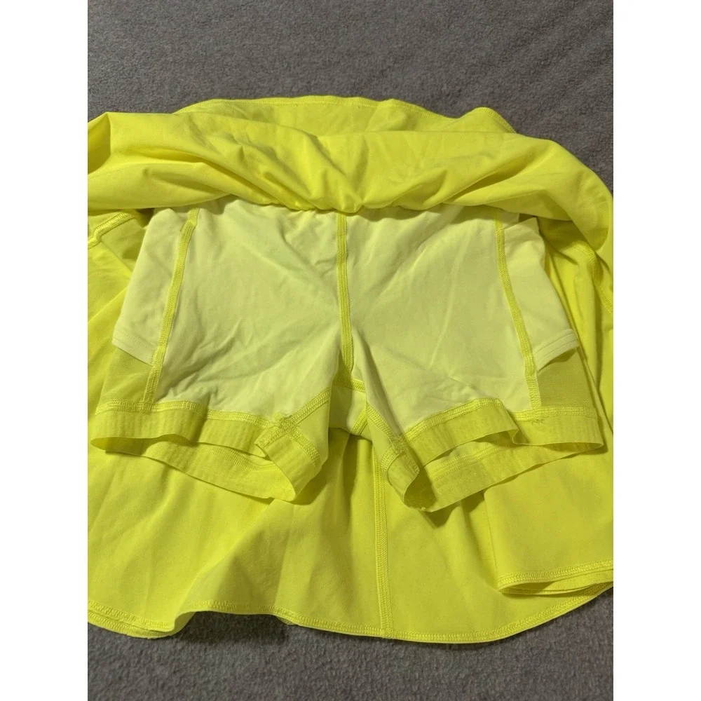 Lululemon Court Rival Perforated HIgh Rise Skirt Skort Highlight Yellow Womens 2